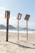 Flagpoles with wooden boxes on top - Copacabana Beach - Rio de Janeiro city - Rio de Janeiro state (RJ) - Brazil