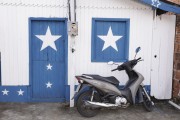 House painted with the colors of Boi Caprichoso in the city of Parintins - Parintins city - Amazonas state (AM) - Brazil