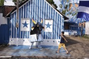 House painted with the colors of Boi Caprichoso in the city of Parintins - Parintins city - Amazonas state (AM) - Brazil