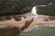 Picture taken with drone of river mouth at Barra do Cahy Beach - Prado city - Bahia state (BA) - Brazil