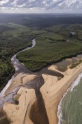 Picture taken with drone of river mouth at Barra do Cahy Beach - Prado city - Bahia state (BA) - Brazil