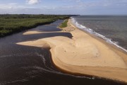 Picture taken with drone of river mouth at Barra do Cahy Beach - Prado city - Bahia state (BA) - Brazil