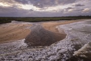 Picture taken with drone of river mouth at Barra do Cahy Beach - Prado city - Bahia state (BA) - Brazil