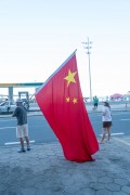 Chinese people holding flags await the passage of Chinese President Xi Jinping during the G20 meeting - Rio de Janeiro city - Rio de Janeiro state (RJ) - Brazil