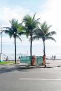 COMLURB street cleaners mowing grass using protective screen - Rio de Janeiro city - Rio de Janeiro state (RJ) - Brazil