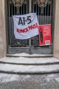Performance Many Hands Make the Weight Lighter - Resistance Campaign, in which 200 kilos of coarse salt were deposited at the buildings central gate, by artists Julia Cseko and Joana Traub Cseko, during the AI-5 Never Again demonstration, held in front of the building of the now-defunct DOPS - Department of Political and Social Order, a repressive body of the military dictatorship, marking the 56th anniversary of Institutional Act No. 5, organized by the RJ Collectives Memory, Truth, Justice and Reparation, with the participation of visual and theatrical artists - Rua da Relaçao 40  - Rio de Janeiro city - Rio de Janeiro state (RJ) - Brazil