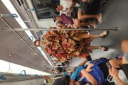 Mayra in her Folharal costume on the subway - Stop 7 of the year 2024 - Rio de Janeiro city - Rio de Janeiro state (RJ) - Brazil