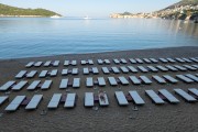 Woman in bikini lying on sun lounger - Jakob Beach - Dubrovnik - Dubrovnik-Neretva County - Croatia