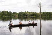 Children in a canoe on Mamiraua Lake - Mamiraua Sustainable Development Reserve - Alvaraes city - Amazonas state (AM) - Brazil