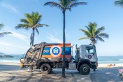 A truck from COMLURB (urban cleaning company of Rio de Janeiro) collecting trash from Arpoador Beach. - Rio de Janeiro city - Rio de Janeiro state (RJ) - Brazil