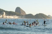 Practitioners of Stand up paddle watching the sunrise - post 6 of Copacabana Beach - Rio de Janeiro city - Rio de Janeiro state (RJ) - Brazil