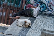Homeless with a dog sleeping on the sidewalk of Francisco Otaviano Street - Rio de Janeiro city - Rio de Janeiro state (RJ) - Brazil