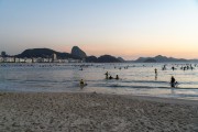 Practitioners of Stand up paddle watching the sunrise - post 6 of Copacabana Beach - Rio de Janeiro city - Rio de Janeiro state (RJ) - Brazil
