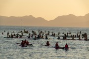 Practitioners of Stand up paddle watching the sunrise - post 6 of Copacabana Beach - Rio de Janeiro city - Rio de Janeiro state (RJ) - Brazil