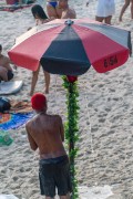 Bather taking a shower at Arpoador Beach. - Rio de Janeiro city - Rio de Janeiro state (RJ) - Brazil