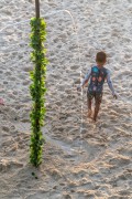 Bather taking a shower at Arpoador Beach. - Rio de Janeiro city - Rio de Janeiro state (RJ) - Brazil