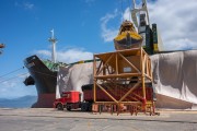 Truck being loaded with imported fertilizer - Paranagua city - Parana state (PR) - Brazil