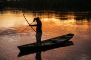 Indigenous fishing with bow and arrow at sunrise - Mamiraua Sustainable Development Reserve - Alvaraes city - Amazonas state (AM) - Brazil