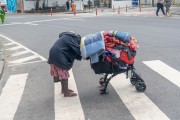 Homeless woman carrying her belongings on Atlantica Avenue - Rio de Janeiro city - Rio de Janeiro state (RJ) - Brazil