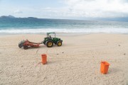 Refuse collectors cleaning the Ipanema Beach with tractor - Rio de Janeiro city - Rio de Janeiro state (RJ) - Brazil