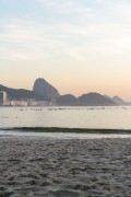 Practitioners of Stand up paddle watching the sunrise - post 6 of Copacabana Beach - Rio de Janeiro city - Rio de Janeiro state (RJ) - Brazil