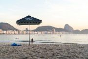 Practitioners of Stand up paddle watching the sunrise - post 6 of Copacabana Beach - Rio de Janeiro city - Rio de Janeiro state (RJ) - Brazil