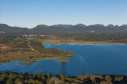 Picture taken with drone of Irai Dam lake with the Serra do Mar mountain range in the background - Quatro Barras city - Parana state (PR) - Brazil