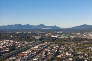 Picture taken with drone of Quatro Barras with the Serra do Mar mountain range in the background - Quatro Barras city - Parana state (PR) - Brazil