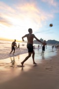 Bathers playing soccer - Arpoador Beach waterfront with the Morro Dois Irmaos (Two Brothers Mountain) in the background - Rio de Janeiro city - Rio de Janeiro state (RJ) - Brazil