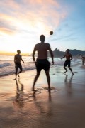 Bathers playing soccer - Arpoador Beach waterfront with the Morro Dois Irmaos (Two Brothers Mountain) in the background - Rio de Janeiro city - Rio de Janeiro state (RJ) - Brazil