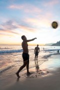 Bathers playing soccer - Arpoador Beach waterfront with the Morro Dois Irmaos (Two Brothers Mountain) in the background - Rio de Janeiro city - Rio de Janeiro state (RJ) - Brazil