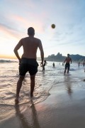 Bathers playing soccer - Arpoador Beach waterfront with the Morro Dois Irmaos (Two Brothers Mountain) in the background - Rio de Janeiro city - Rio de Janeiro state (RJ) - Brazil
