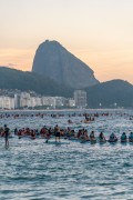 Practitioners of Stand up paddle watching the sunrise - post 6 of Copacabana Beach - Rio de Janeiro city - Rio de Janeiro state (RJ) - Brazil