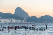 Practitioners of Stand up paddle watching the sunrise - post 6 of Copacabana Beach - Rio de Janeiro city - Rio de Janeiro state (RJ) - Brazil