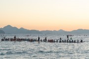 Practitioners of Stand up paddle watching the sunrise - post 6 of Copacabana Beach - Rio de Janeiro city - Rio de Janeiro state (RJ) - Brazil