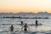 Practitioners of Stand up paddle watching the sunrise - post 6 of Copacabana Beach - Rio de Janeiro city - Rio de Janeiro state (RJ) - Brazil