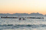Practitioners of Stand up paddle watching the sunrise - post 6 of Copacabana Beach - Rio de Janeiro city - Rio de Janeiro state (RJ) - Brazil