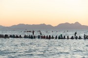 Practitioners of Stand up paddle watching the sunrise - post 6 of Copacabana Beach - Rio de Janeiro city - Rio de Janeiro state (RJ) - Brazil