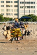 Street vendor selling sunglasses and hats - Copacabana Beach - Rio de Janeiro city - Rio de Janeiro state (RJ) - Brazil